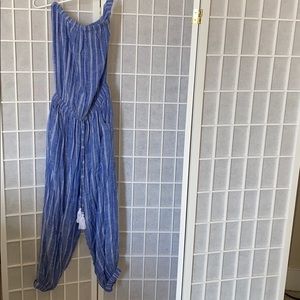 Strapless jumpsuit with tie tassels